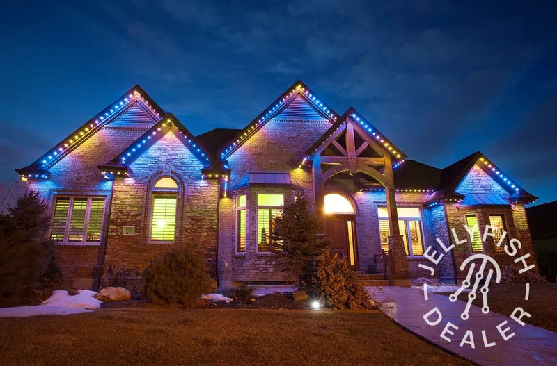 Blue and yellow team-color permanent holiday lighting